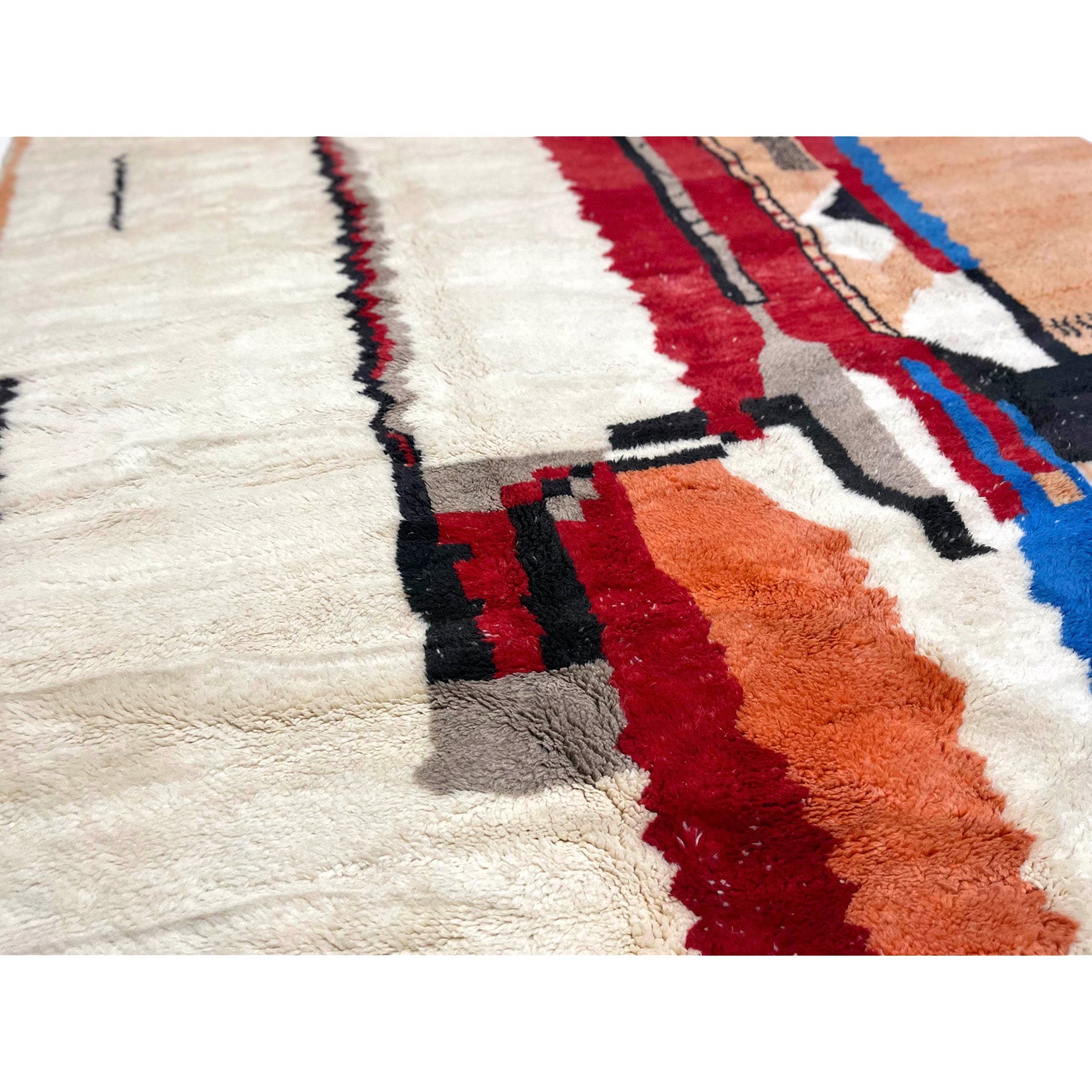 Colorful Moroccan rug in white, red, orange, blue, and grey - Kantara | Moroccan Rugs