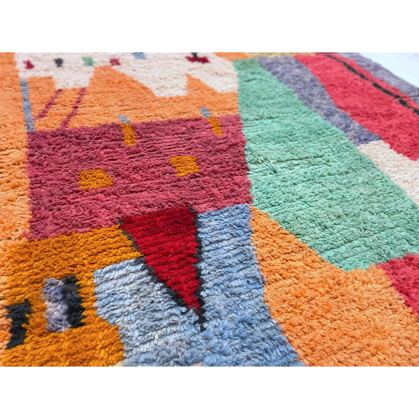Abstract Moroccan rug in orange, maroon, bright red, seafoam green, pink, and lilac - Kantara | Moroccan Rugs