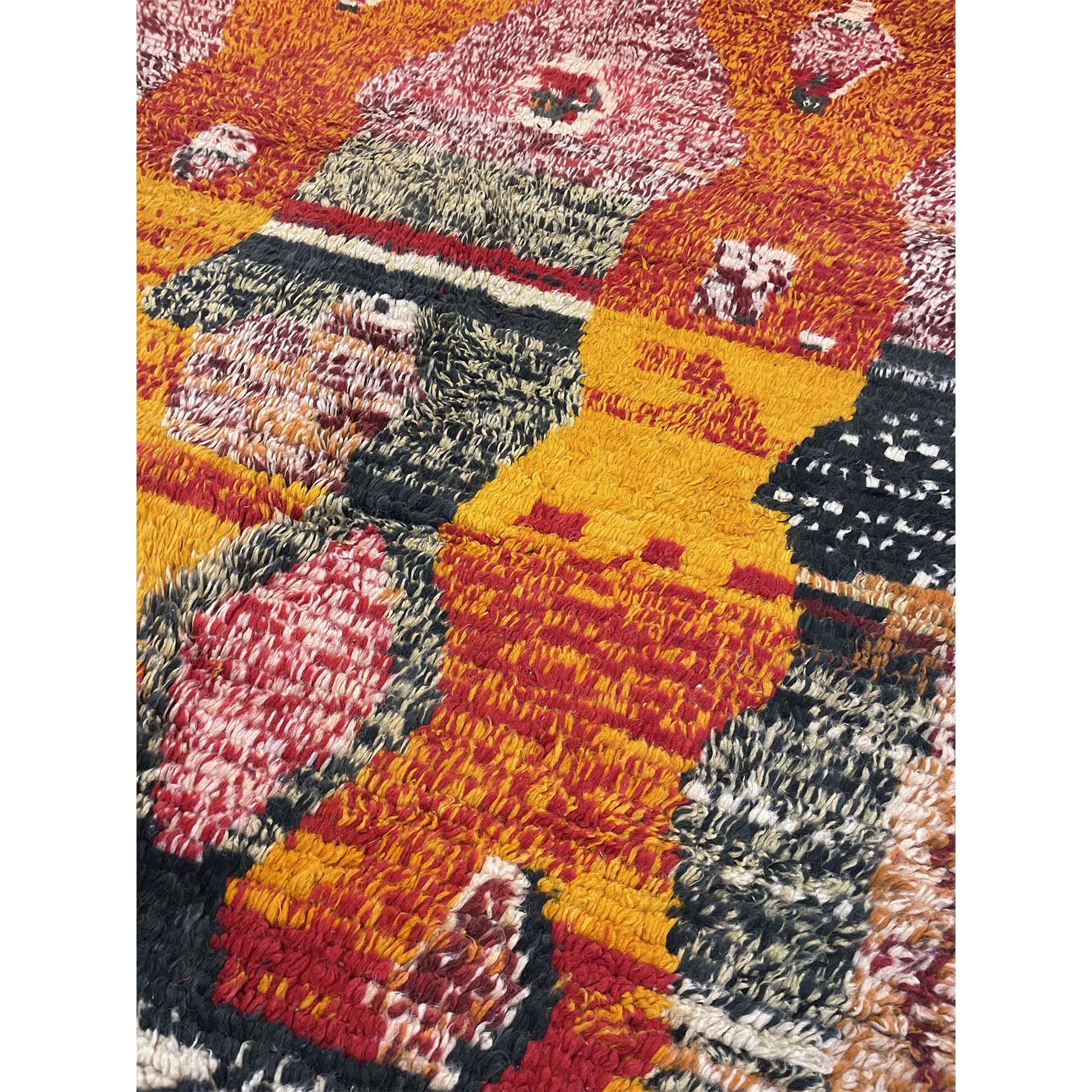 Plush handwoven Moroccan area rug in red, orange, yellow - Kantara | Moroccan Rugs