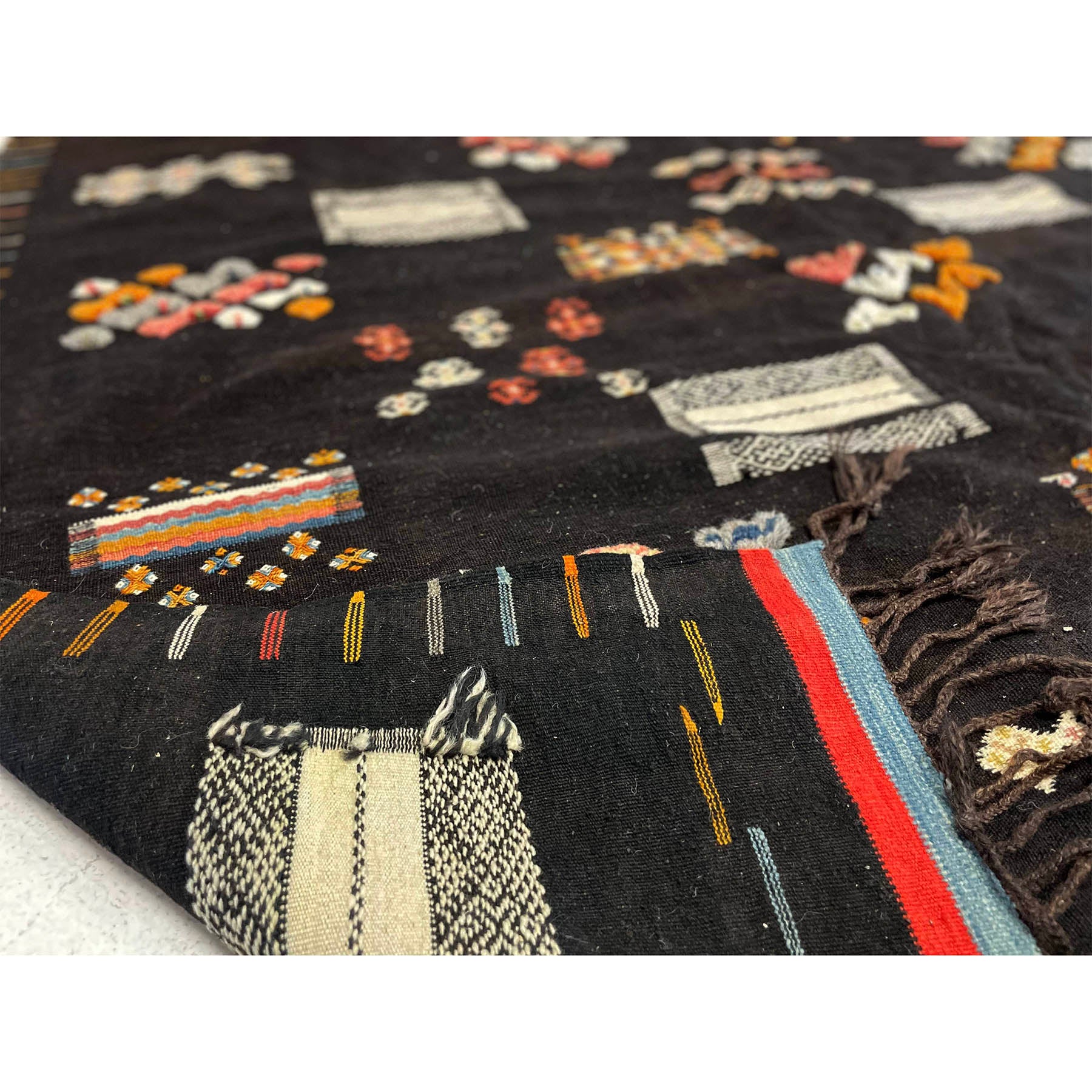 One-of-a-kind boho chic dark colored Moroccan rug - Kantara | Moroccan Rugs