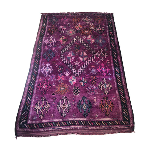 Vintage purple Moroccan rug with tribal motifs
