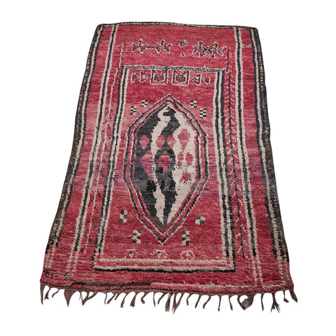 Vintage red Moroccan rug with black and white details