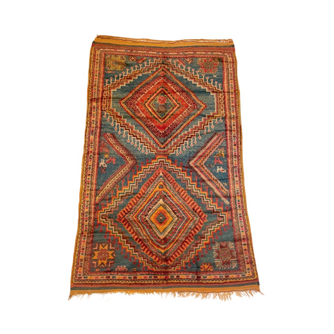 traditional tribal berber rug in shades of orange and blue ait ouaouzguite rug
