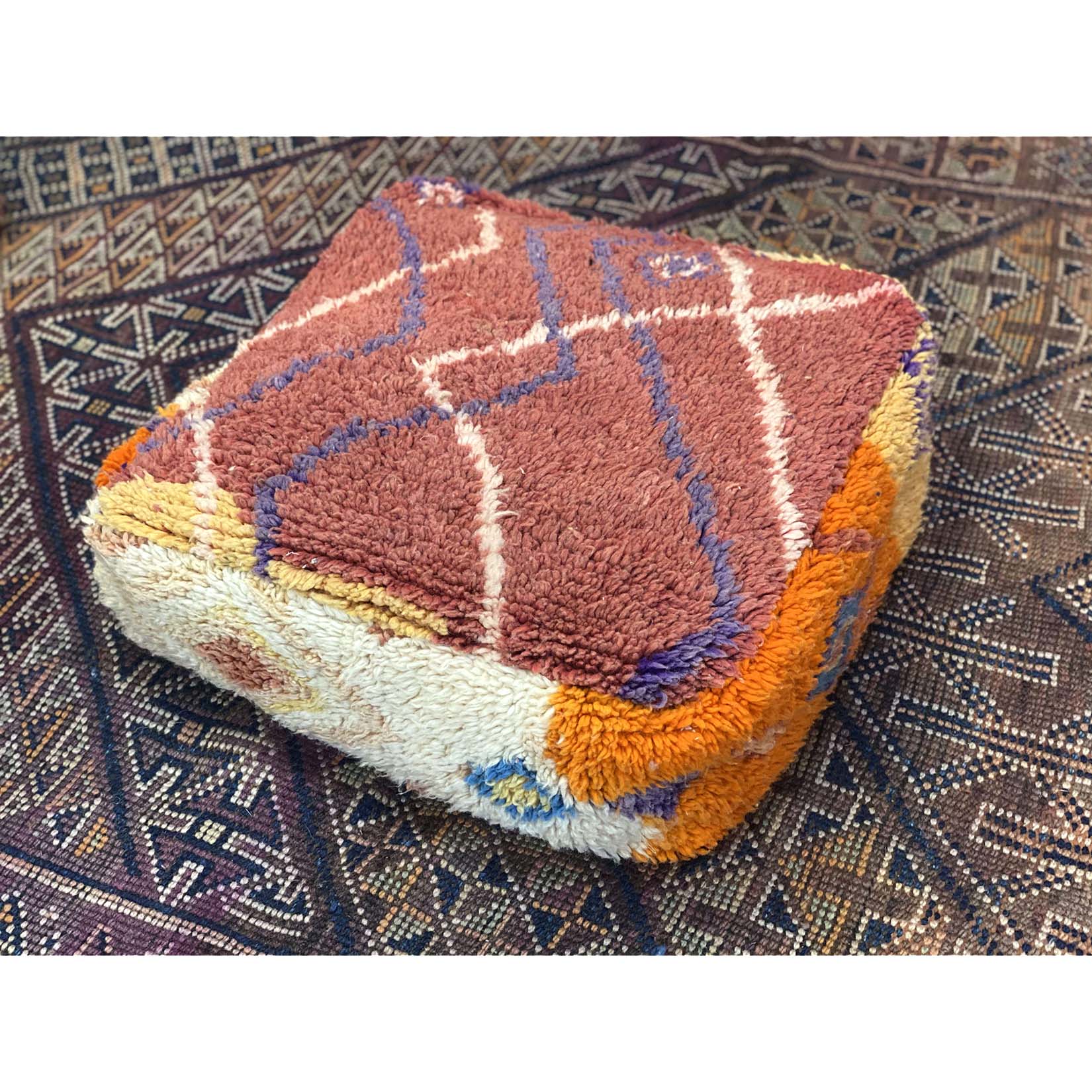 Boho chic red, orange, and white Moroccan floor pouf pillow - Kantara | Moroccan Rugs