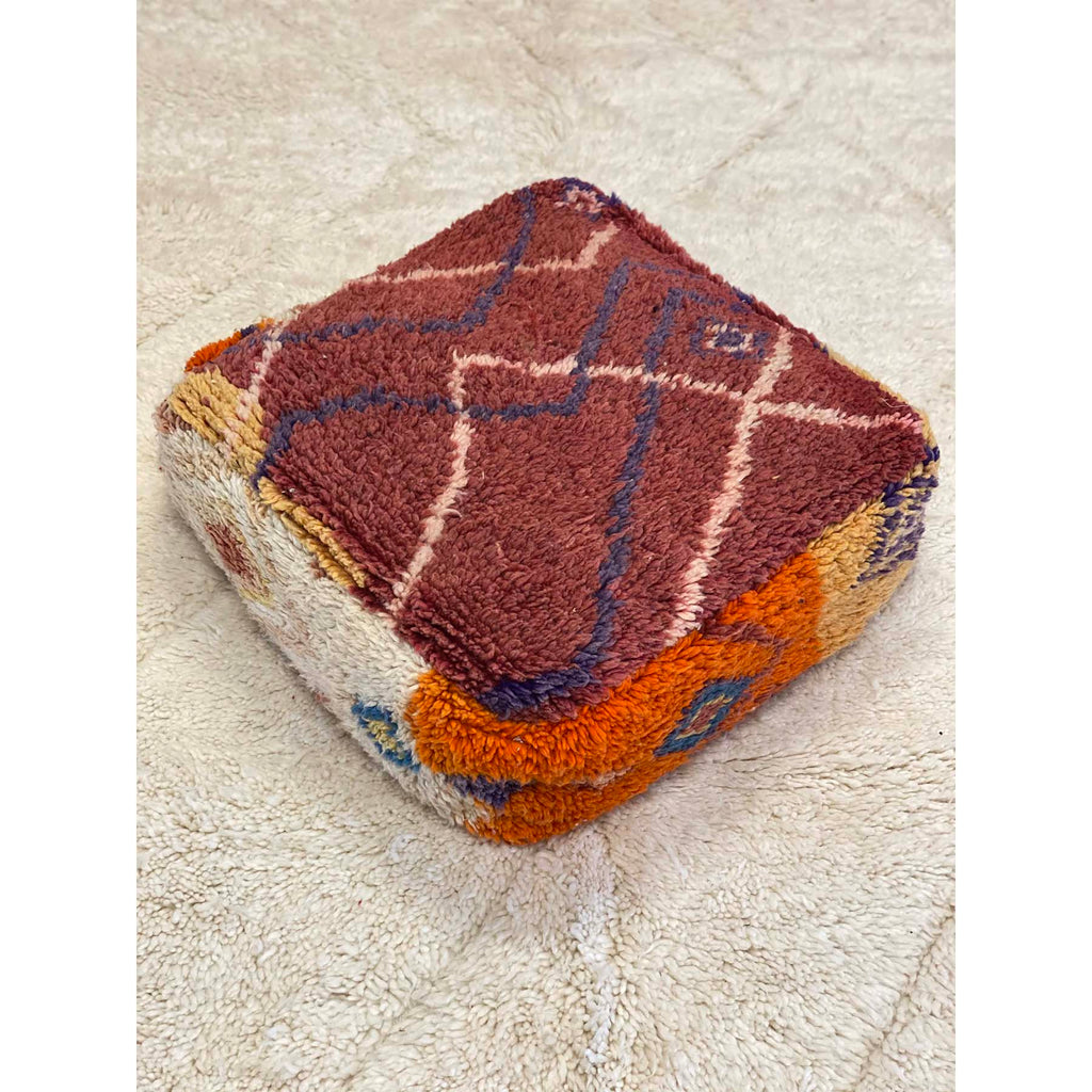 Boho chic red, orange, and white Moroccan floor pouf pillow - Kantara | Moroccan Rugs