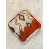 Colorful floor pouf made from upcycled orange and white Moroccan rug - Kantara | Moroccan Rugs