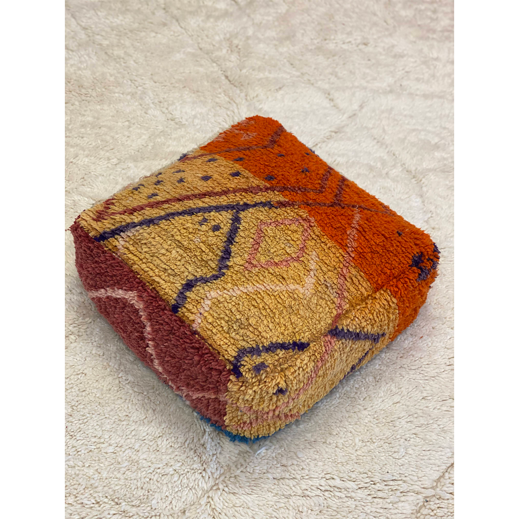 Yellow and orange Moroccan floor pouf with geometric pattern design - Kantara | Moroccan Rugs