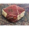 Faded red Moroccan floor pouf pillow - Kantara | Moroccan Rugs