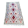 White Moroccan diamond rug with pink detail  - Kantara | Moroccan Rugs