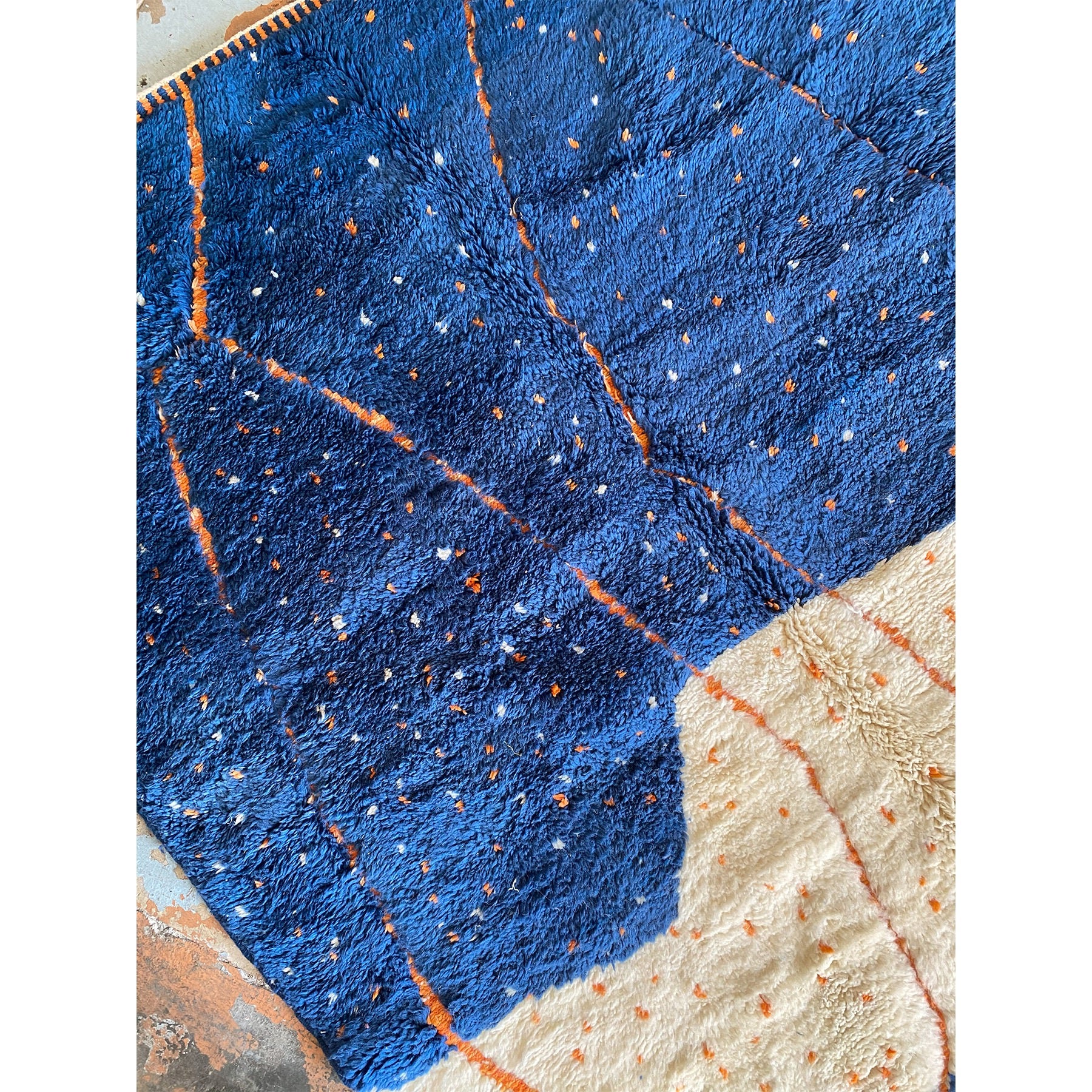 Custom handwoven wool Moroccan berber area rug in blue and white - Kanatara | Moroccan Rugs