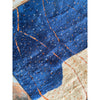 Custom handwoven wool Moroccan berber area rug in blue and white - Kanatara | Moroccan Rugs