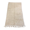 Mid century modern cream-colored Moroccan bedside rug - Kantara | Moroccan Rugs