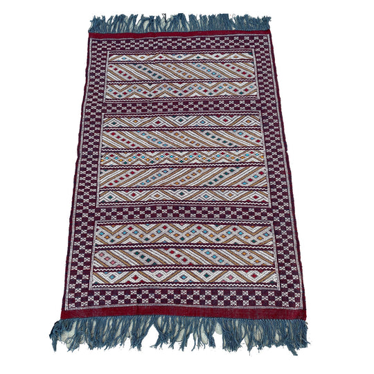 Maroon Moroccan flatweave kilim with colorful details - Kantara | Moroccan Rugs