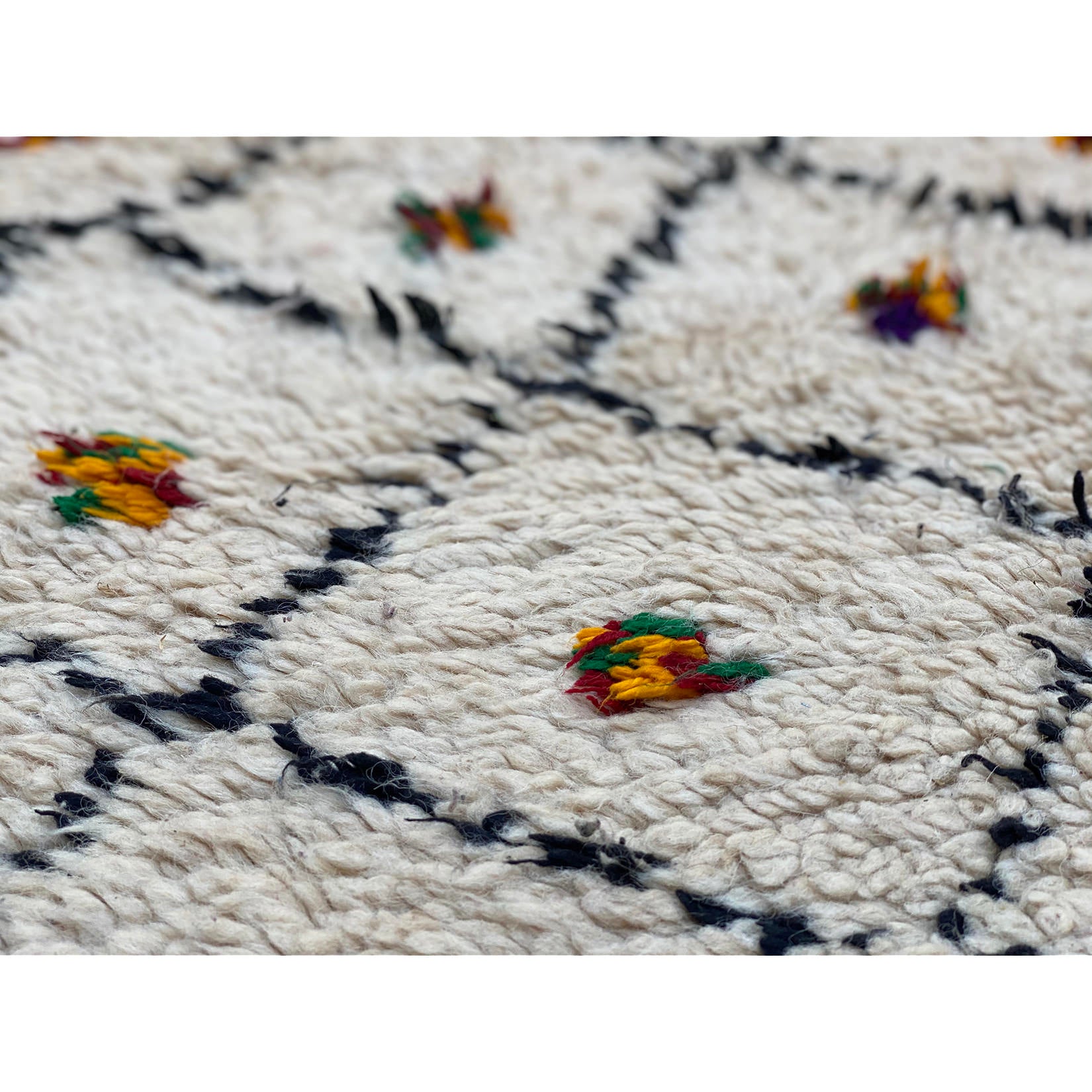 Black and white Moroccan diamond rug with colorful cotton accents - Kantara | Moroccan Rugs