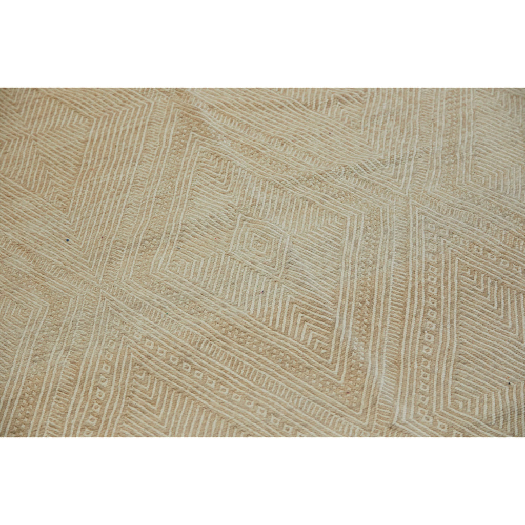 Neutral Moroccan flatweave rug in ecru tones