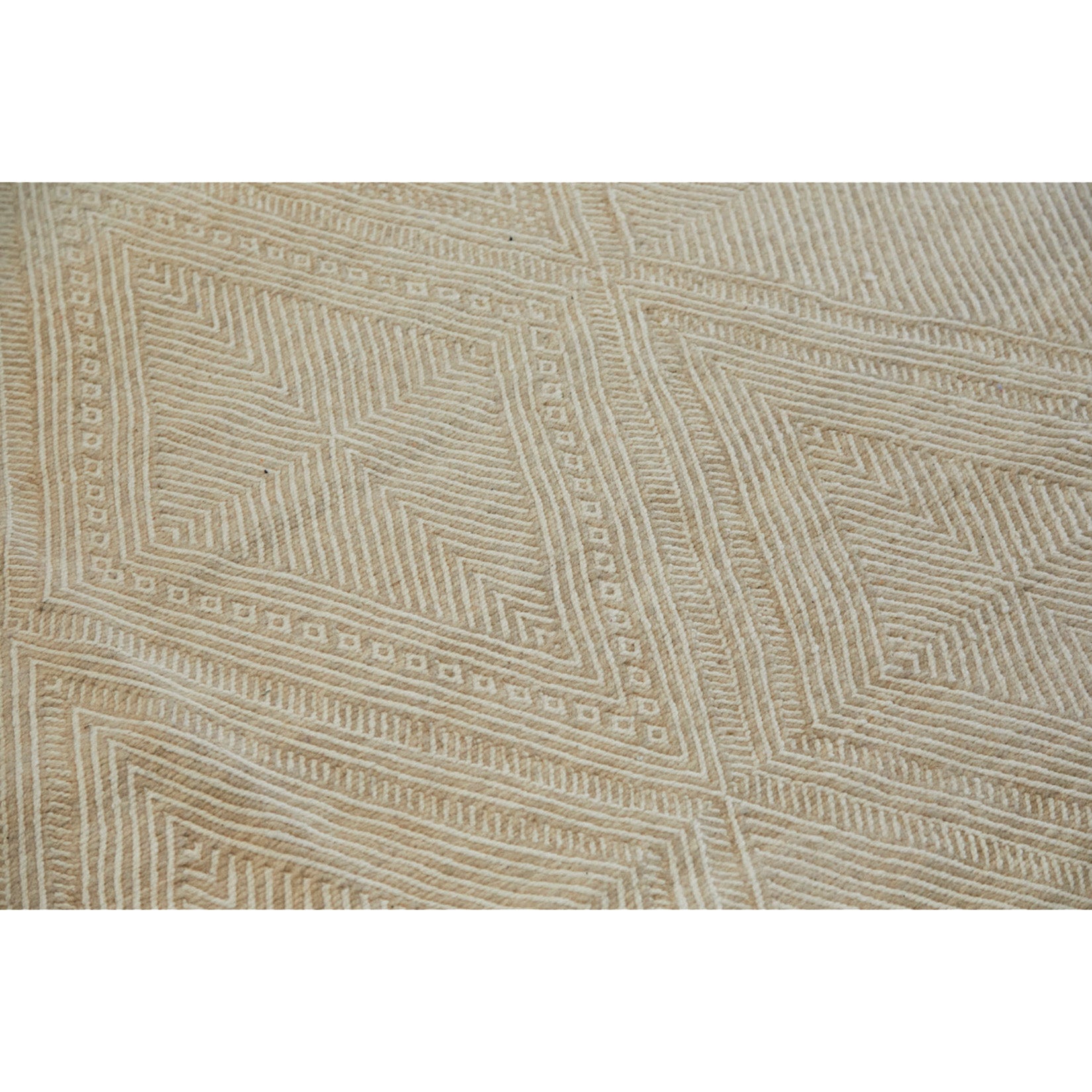 Neutral Moroccan flatweave rug in ecru tones ideal for dining room
