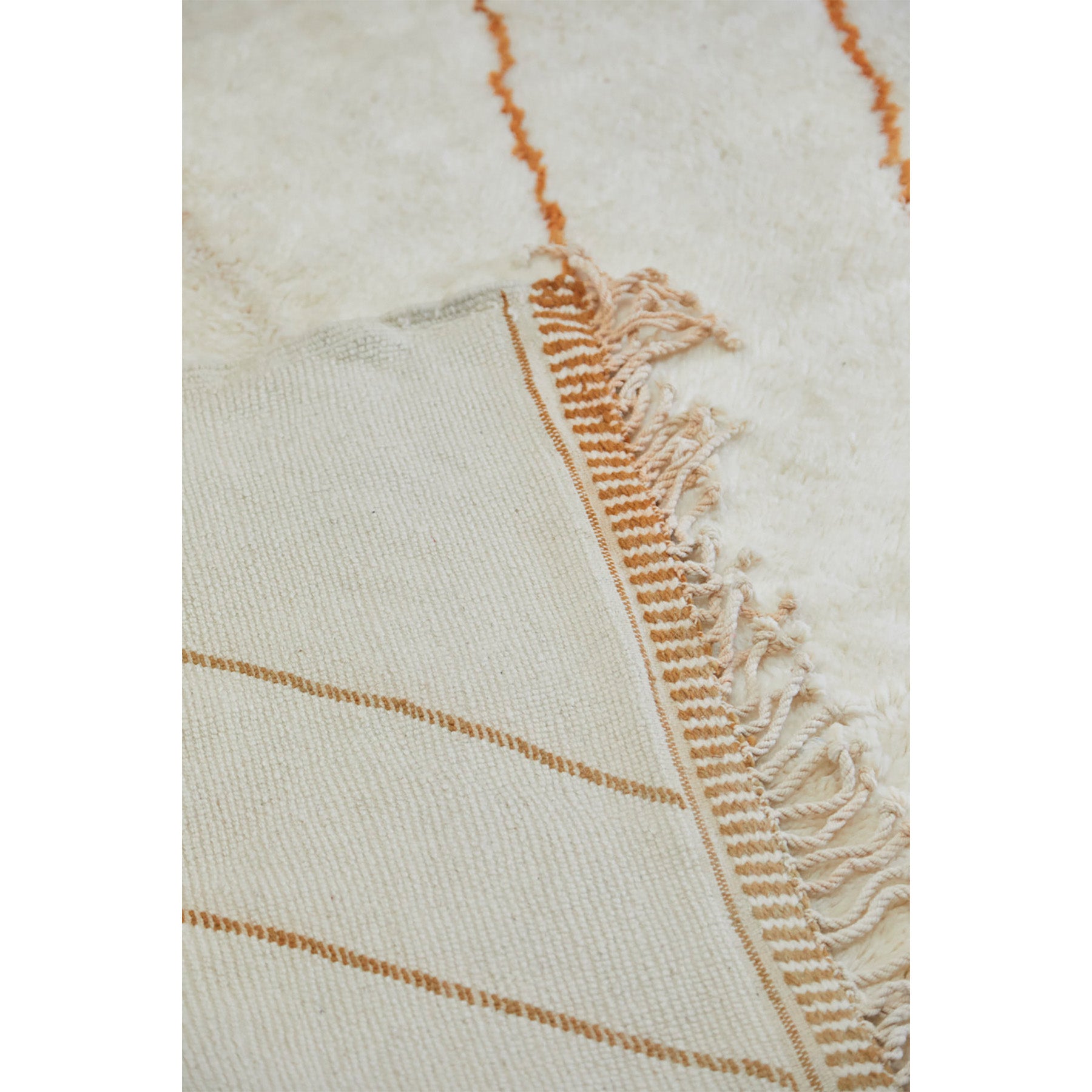 Cream colored Moroccan Beni Ourain rug with abstract design - Kantara | Moroccan Rugs