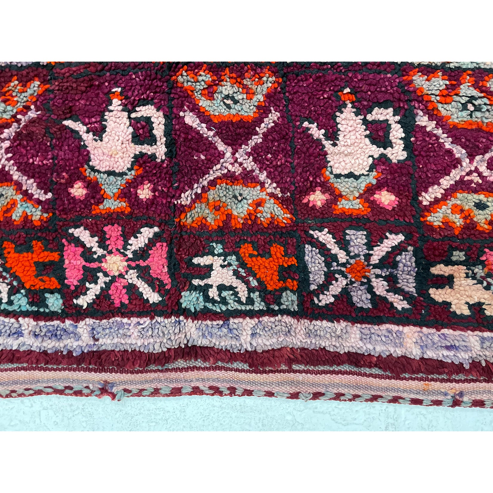 Handwoven pink and purple Moroccan area rug with tribal motifs - Kantara | Moroccan Rugs