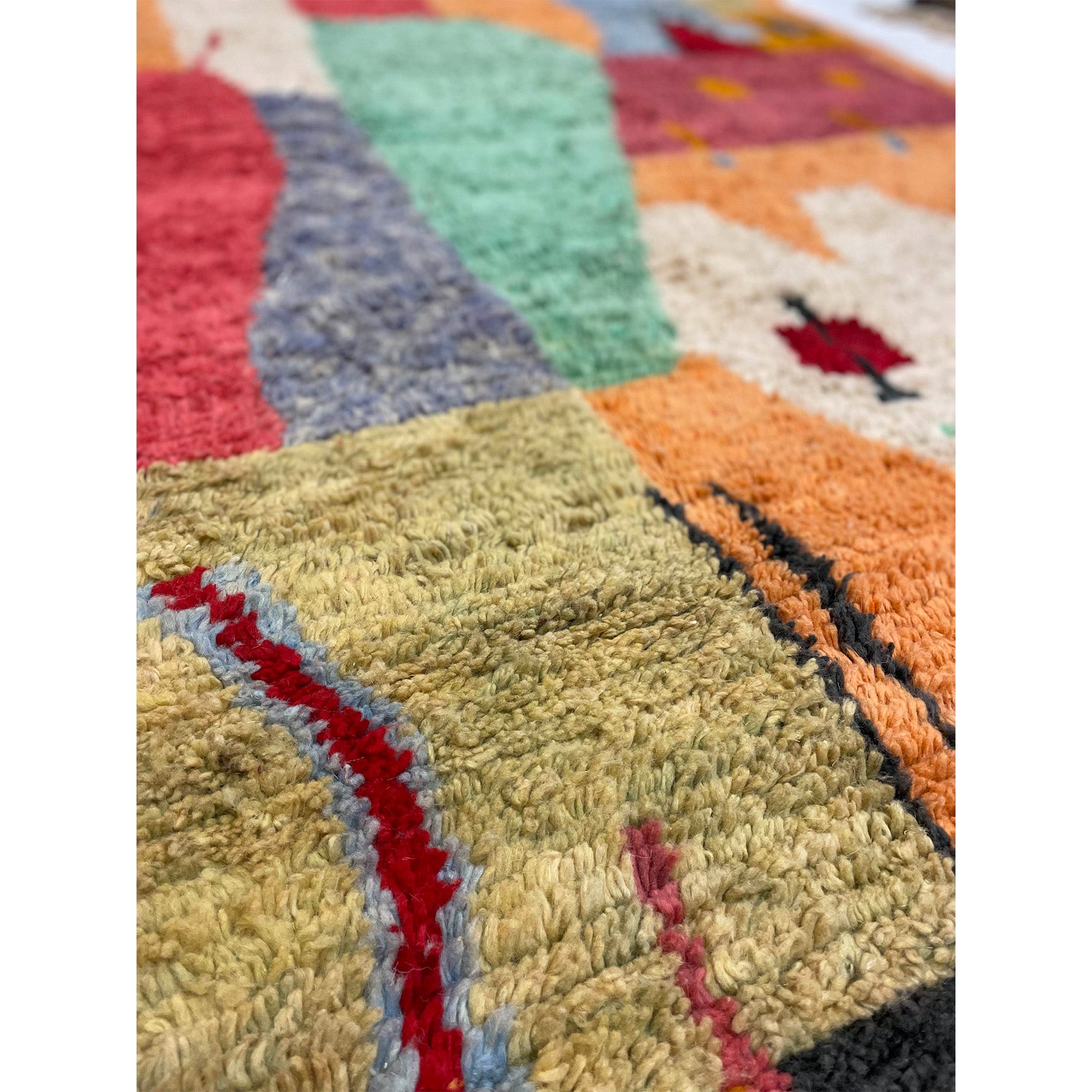 Art deco Moroccan area rug in army green, periwinkle, sea foam green, orange, and red - Kantara | Moroccan Rugs