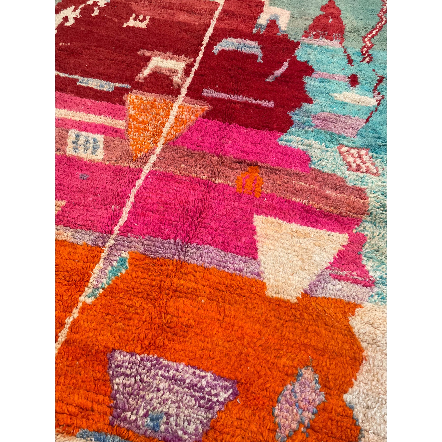 Boho chic Moroccan rug in pink, purple, orange, red, and blue - Kantara | Moroccan Rugs