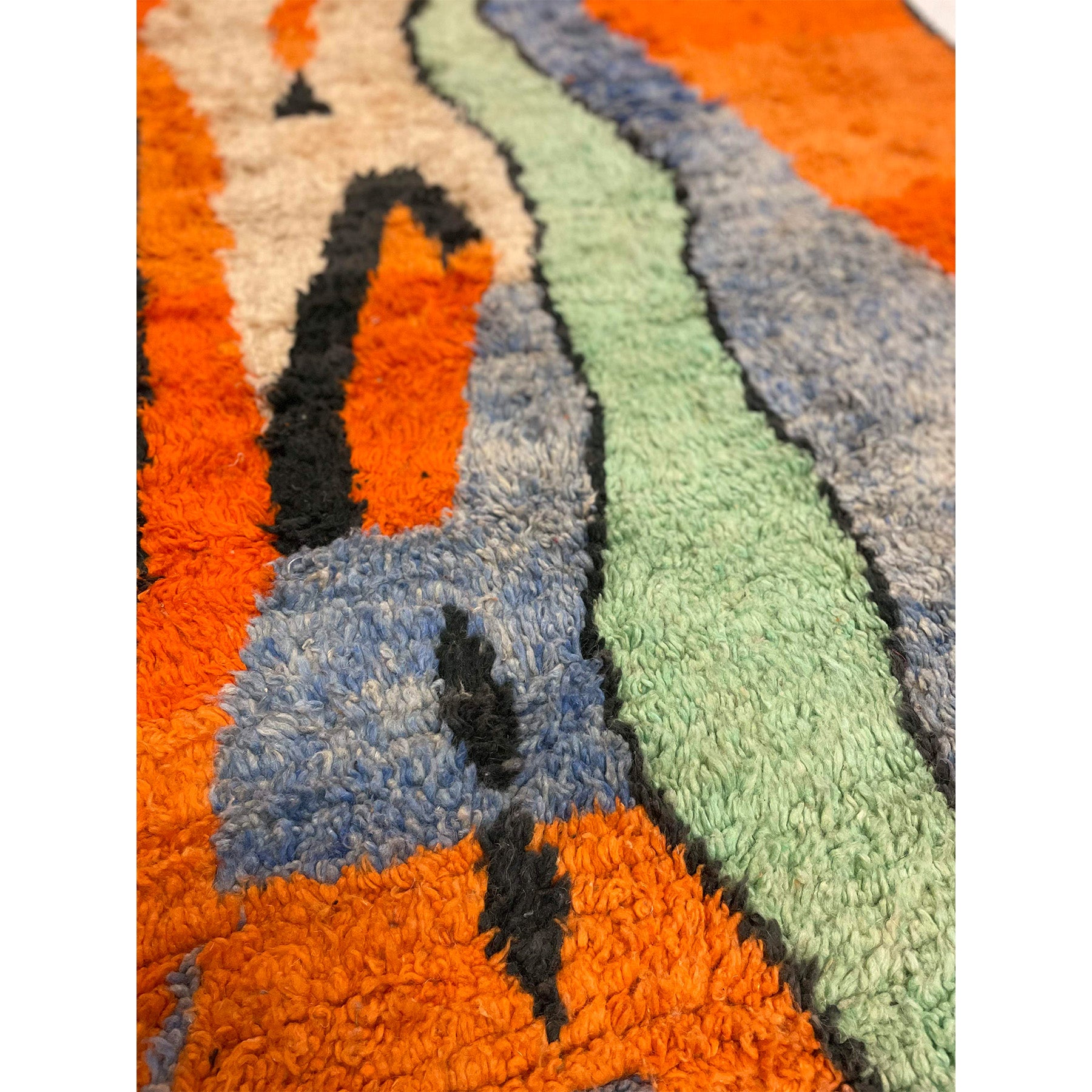 Handwoven Moroccan area rug in orange, blue, and green - Kantara | Moroccan Rugs