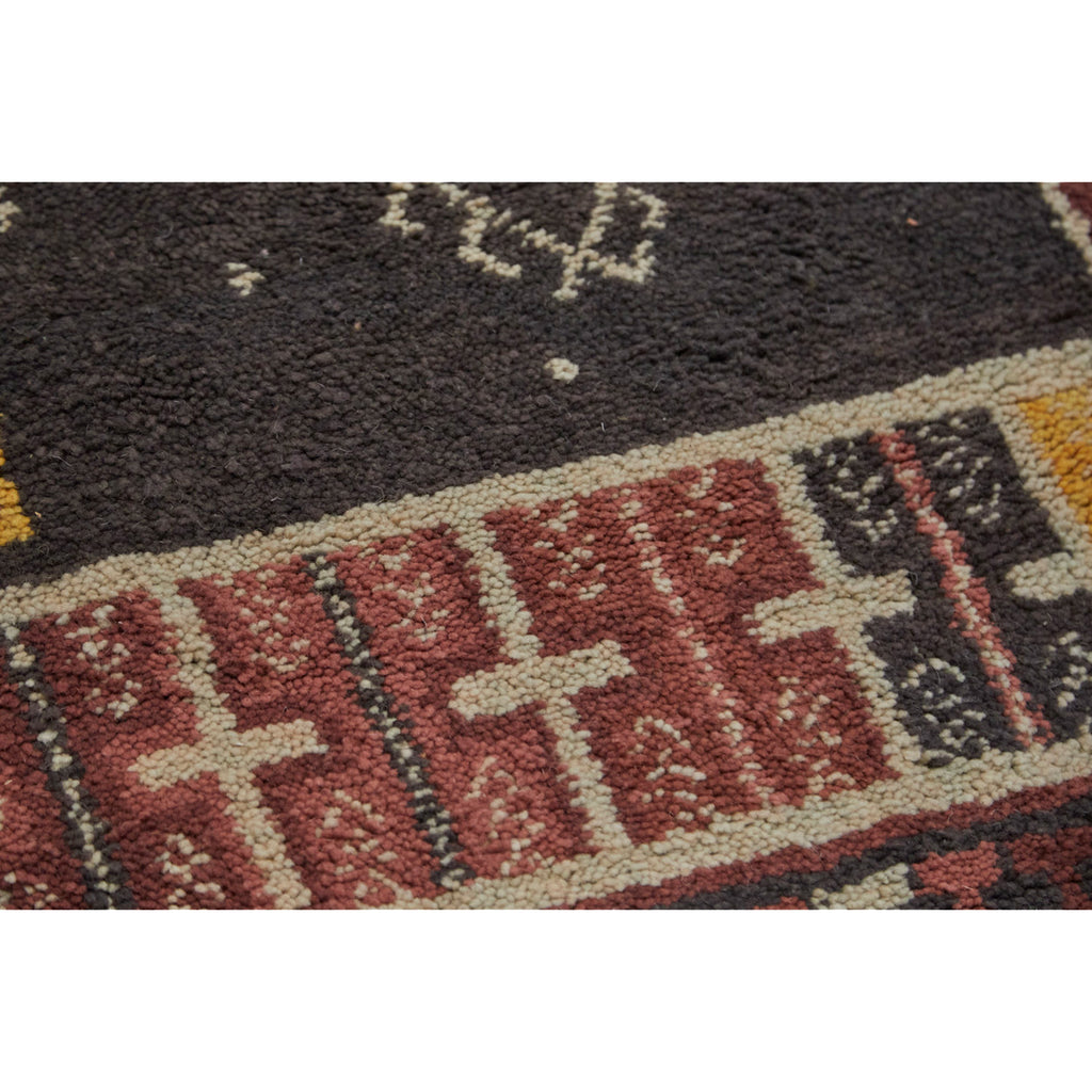 Geometric Moroccan rug in red, yellow, brown, and white - Kantara | Moroccan Rugs