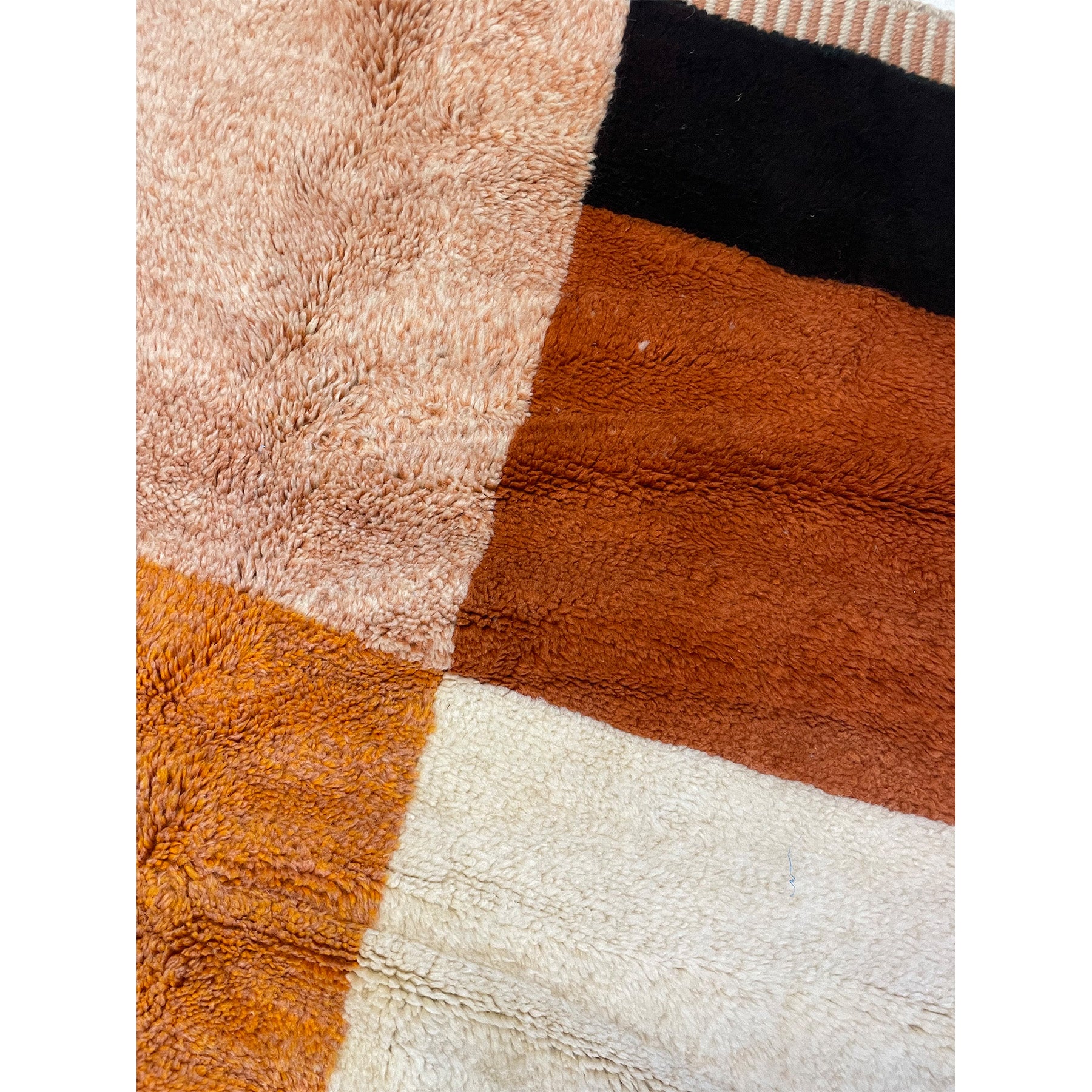 One-of-a-kind Moroccan rug in shades of orange, white, and black - Kantara | Moroccan Rugs