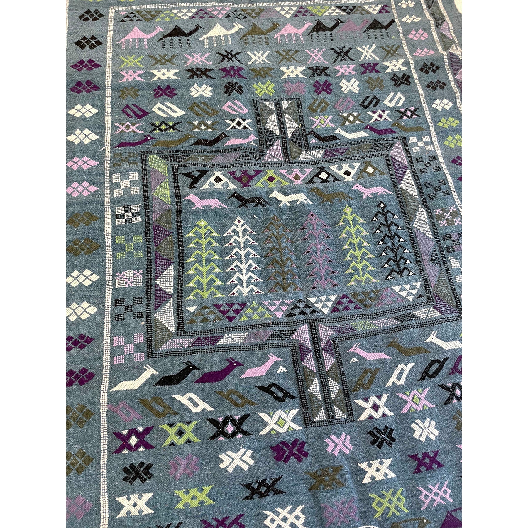 Geometric woven Moroccan flatweave kilim rug with colorful details  | Kantara Moroccan Rugs in Los Angeles
