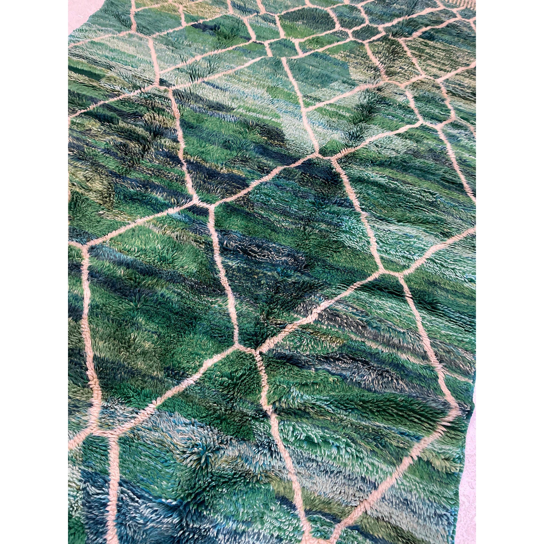 closeup of Beni Ourain style Moroccan rug with contemporary green and blue ombre details  | Kantara Moroccan Rugs in Los Angeles at The Rug Shop