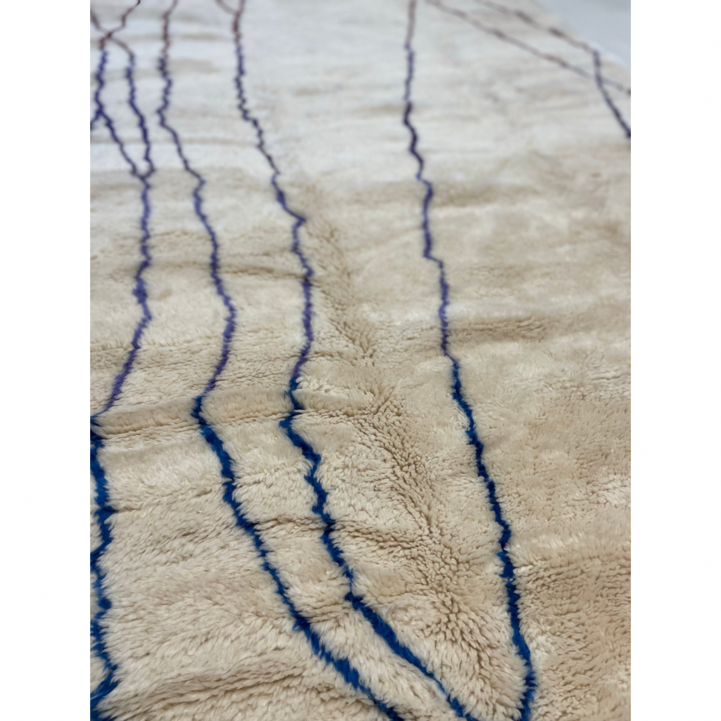 Cream colored Moroccan area rug with colorful linework - Kantara | Moroccan Rugs