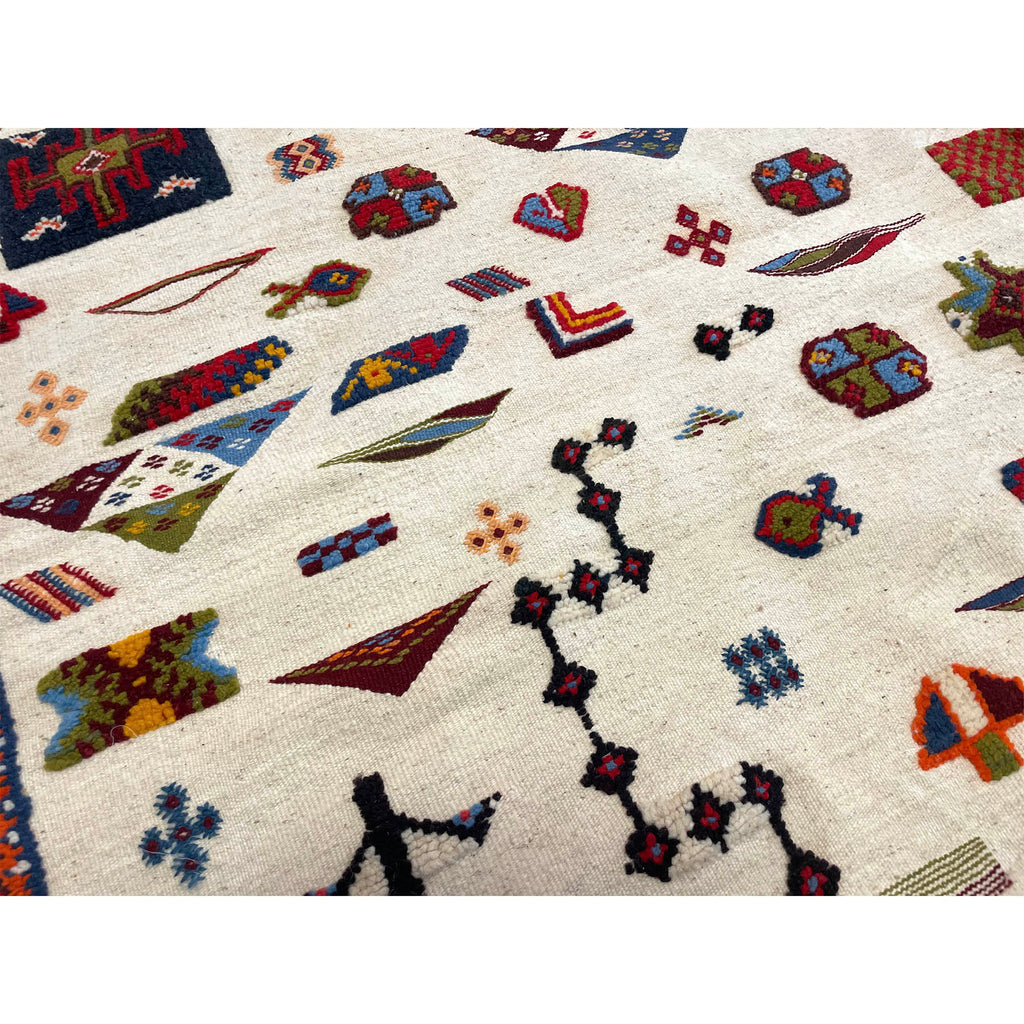 Flatwoven white Moroccan area rug with colorful design - Kantara | Moroccan Rugs