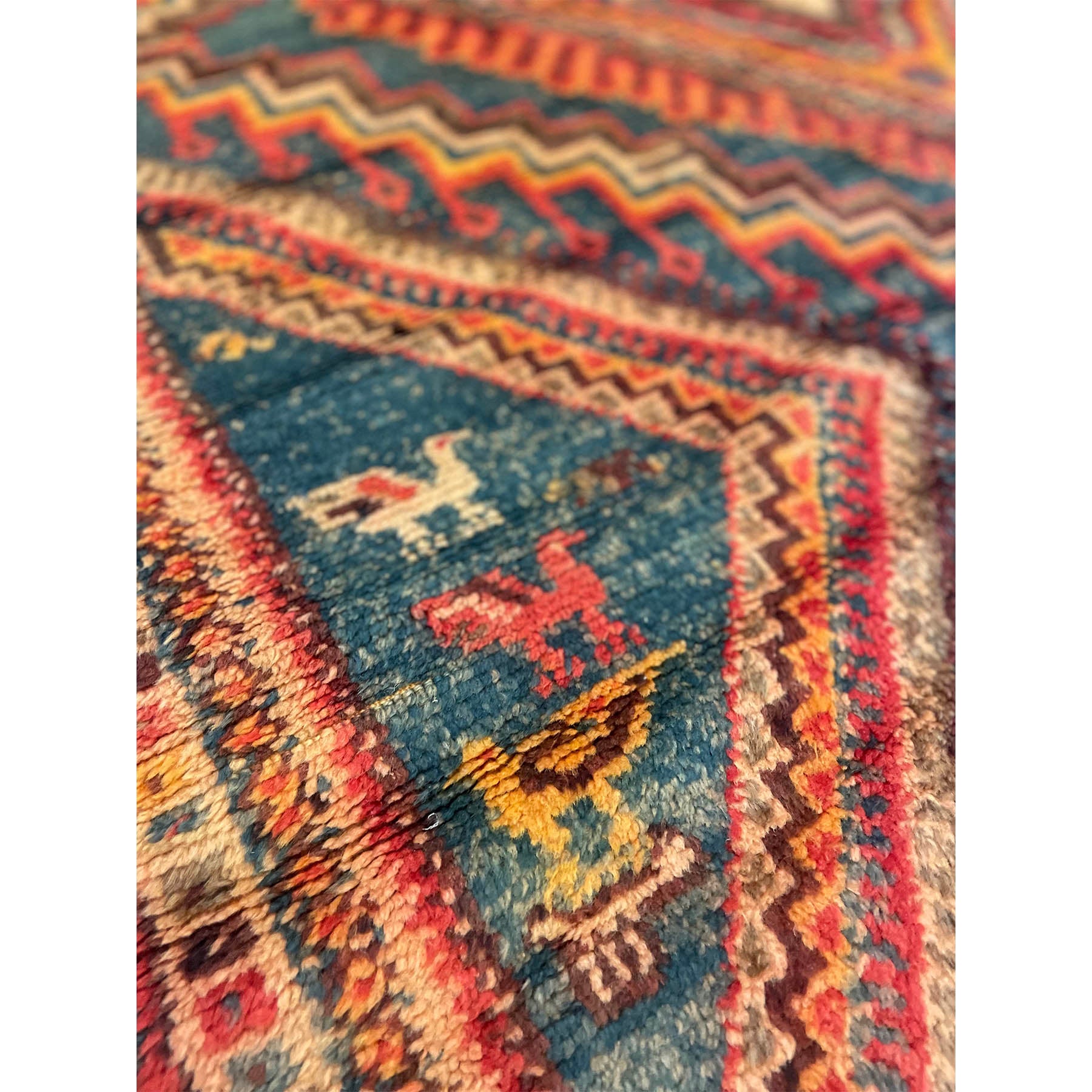 Colorful vintage Moroccan rug with animal motifs - Kantara | Moroccan Rugs