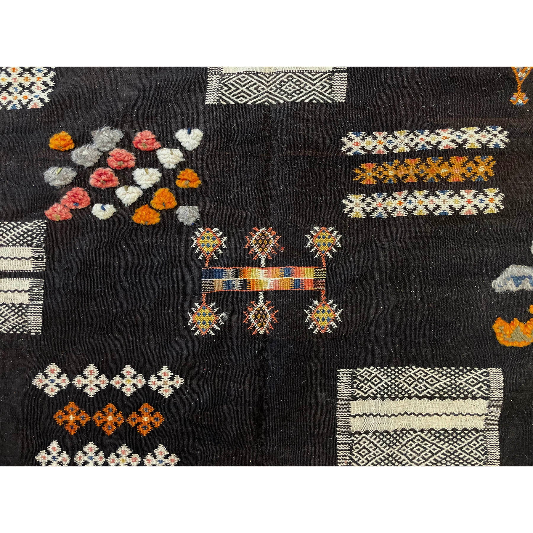Black Moroccan rug with colorful details - Kantara | Moroccan Rugs