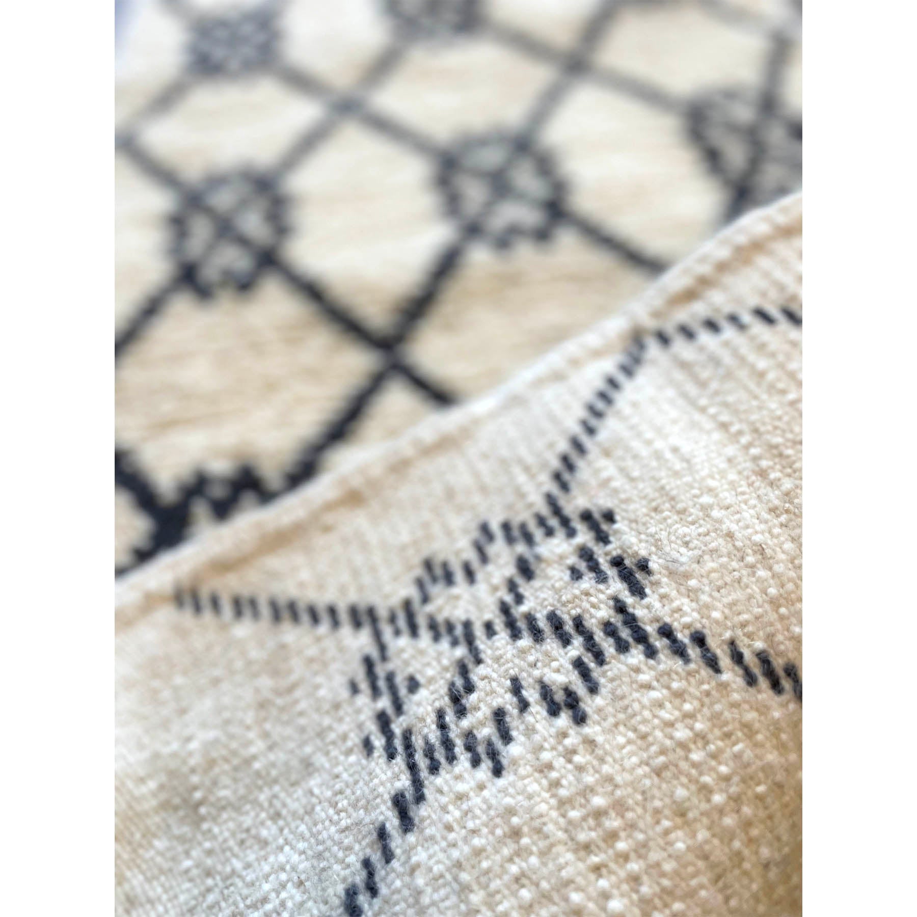 Contemporary handwoven white and black Moroccan throw rugs - Kantara | Moroccan Rugs