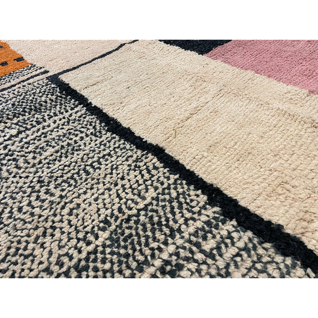 Modern geometric Moroccan area rug in pink, white, and orange - Kantara | Moroccan Rugs