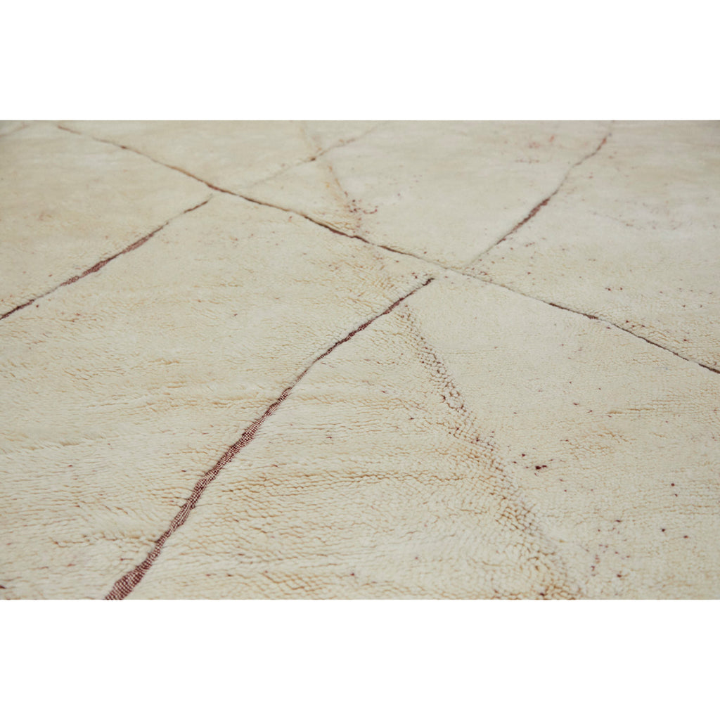 Close up of contemporary oversized Moroccan rug in ivory and red - Kantara | Moroccan Rugs