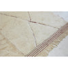 Braided fringe on oversized Moroccan beni mrirt rug in neutral and cranberry red tones  - Kantara | Moroccan Rugs