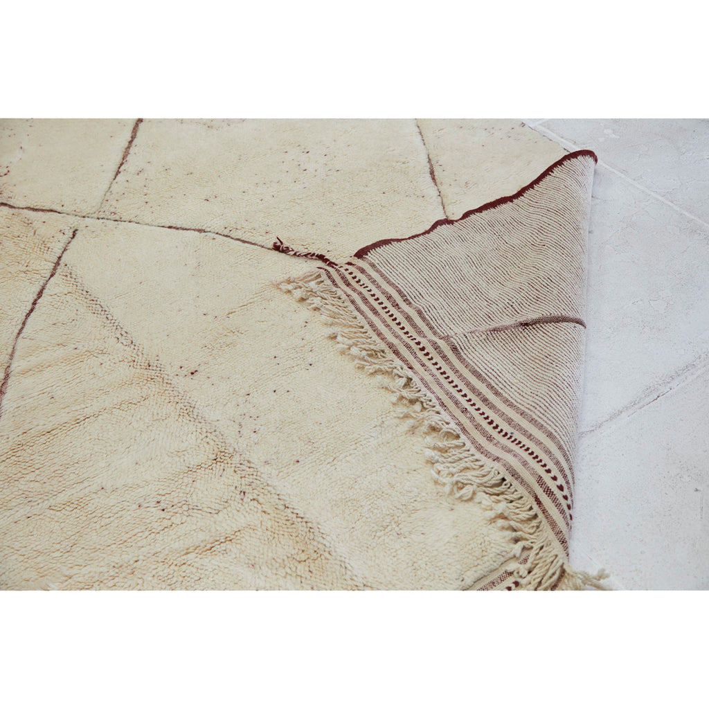 Bohemian berber rug in ivory and red with braided fringe  - Kantara | Moroccan Rugs